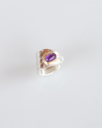 Reptilia silver earcuff with natural gemstone, side view showing the wraparound silhouette.