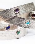 Reptilia Minima cuffs in vermeil (18k gold over recycled silver) with natural gemstones