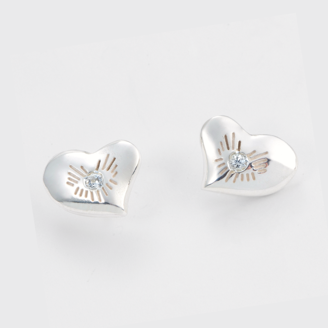 bright heart earrings in sterling silver, with ethical diamonds, detail view. Carlota Guardia Jewelry
