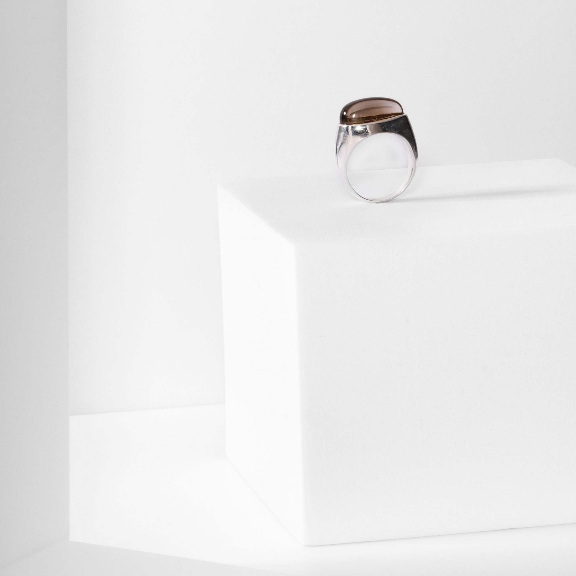 Core ring in recycled sterling silver with smoky quartz by Carlota Guardia, front