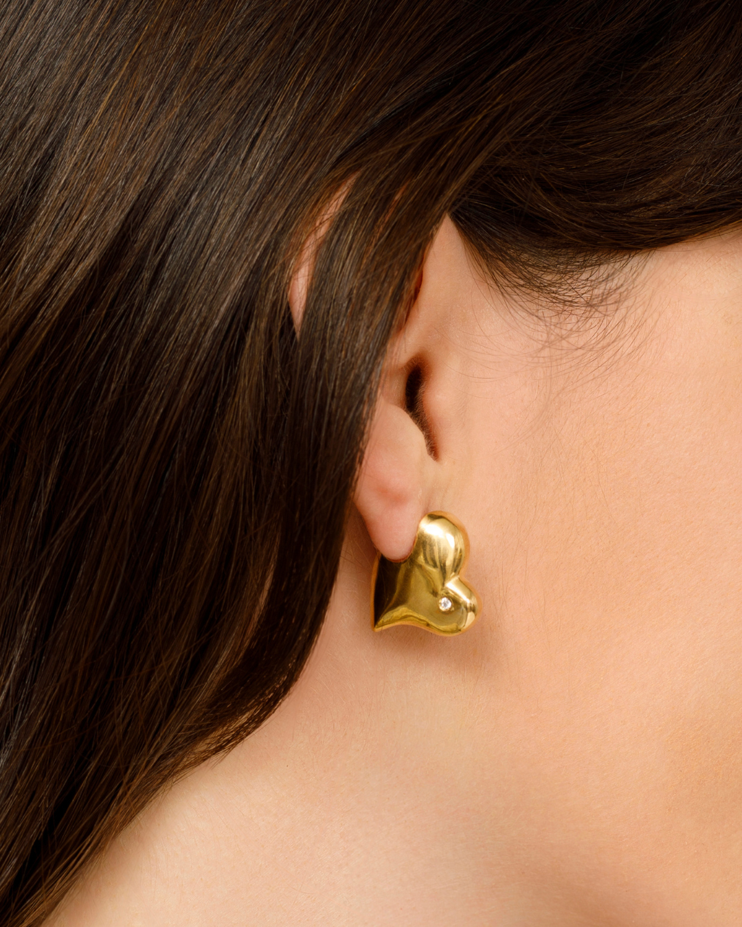 Bitten Heart earring in gold vermeil crafted from recycled sterling silver by Carlota Guardia Jewelry