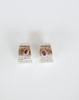 Reptilia silver textured earrings with amethyst front view.
