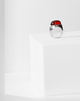 Core ring in recycled sterling silver with garnet by Carlota Guardia, front view