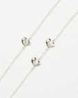 detail-silver-chain-bracelet-hearts-diamonds.png