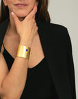 Model wearing the Reptilia Maxima vermeil cuff with lapis lazuli, on-wrist.