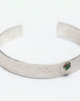 Side view of the Reptilia Mini silver bracelet with natural gemstone.