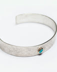 Side view of the Reptilia Mini silver bracelet with natural gemstone.